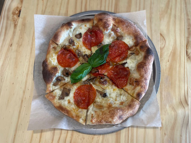 Pizza Rosa - A 12" plain red pie with red sauce, garlic confit, and basicl $14